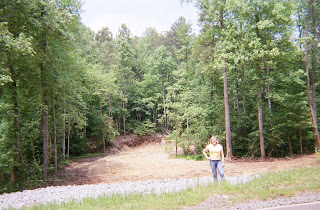 joey-in-front-of-uncleared-property